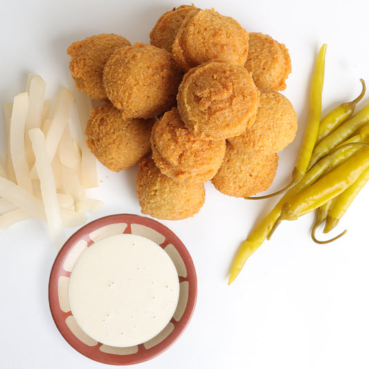 Lebanese Fresh falafel plate comes with Pickled Hot Peppers, Turnip, and Tarator Sauce